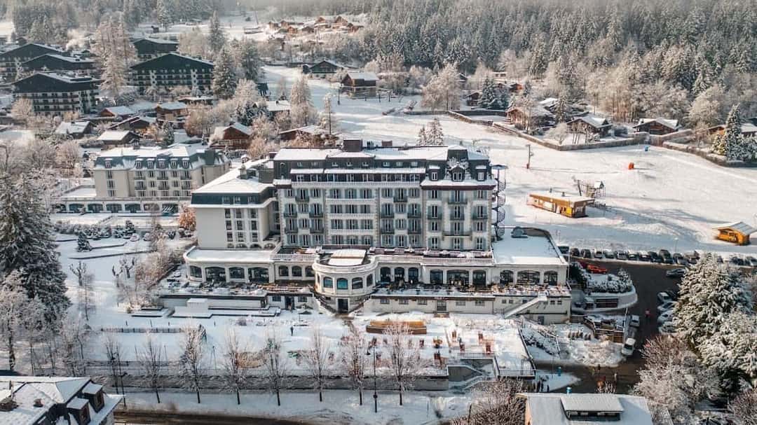 Aerial view of La Folie Douce Hotels Chamonix in the snowy valley
